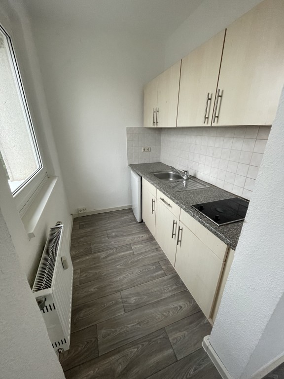 Wohnung mit kleiner Einbauküche